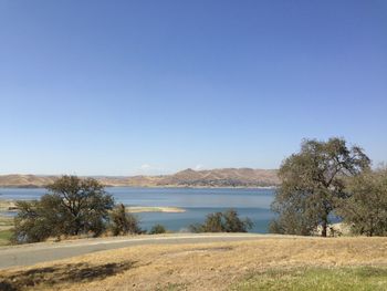 Scenic view of lake against clear sky