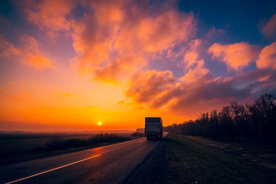 Road against sky during sunset