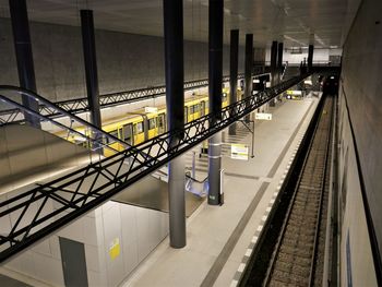 The view into a subway station in berlin at night without people or passengers. 