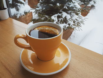 Close-up of coffee served on table