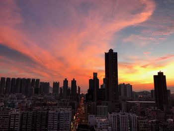 Cityscape against sky during sunset