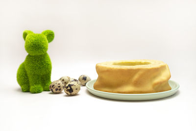 Green hare, rabbit with quail eggs and delicious baumkuchen, sakotis ,sekacz pie on white background