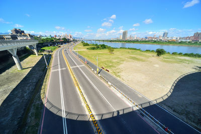 High angle view of cars on sea against sky