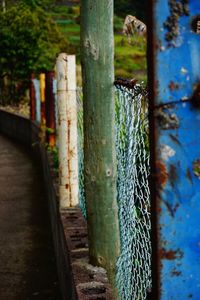 Close-up of rusty metal on wood