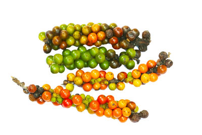 High angle view of fruits on white background