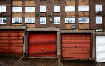 Rows of garages and council house flats in a northern england town