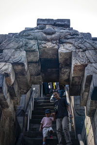 Rear view of people in a temple