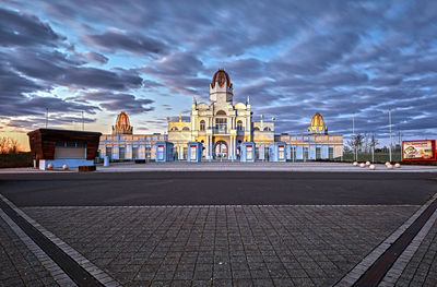 View of building against cloudy sky