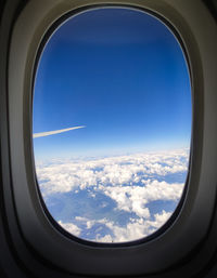 Scenic view of sky seen through airplane window