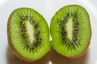 Close-up of lemon slice on white background