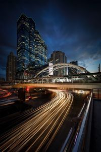 High angle view of light trails on city street at night