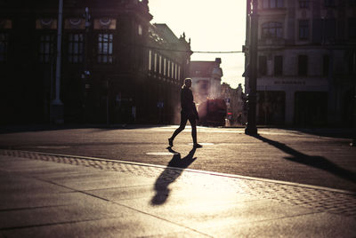 Woman walking on city street