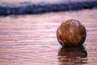 Close-up of soccer ball on water