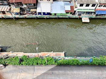 High angle view of pier over lake in city