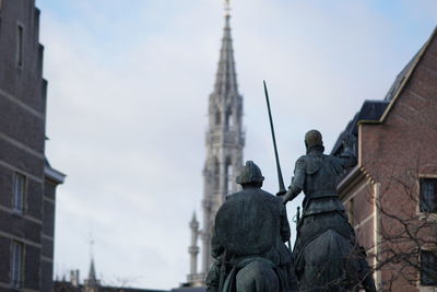 Low angle view of statue against sky