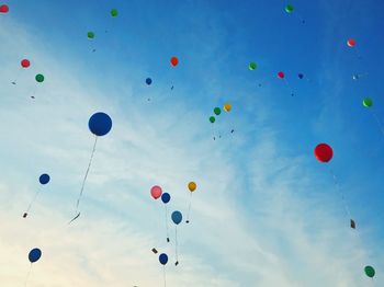 Low angle view of balloons in sky