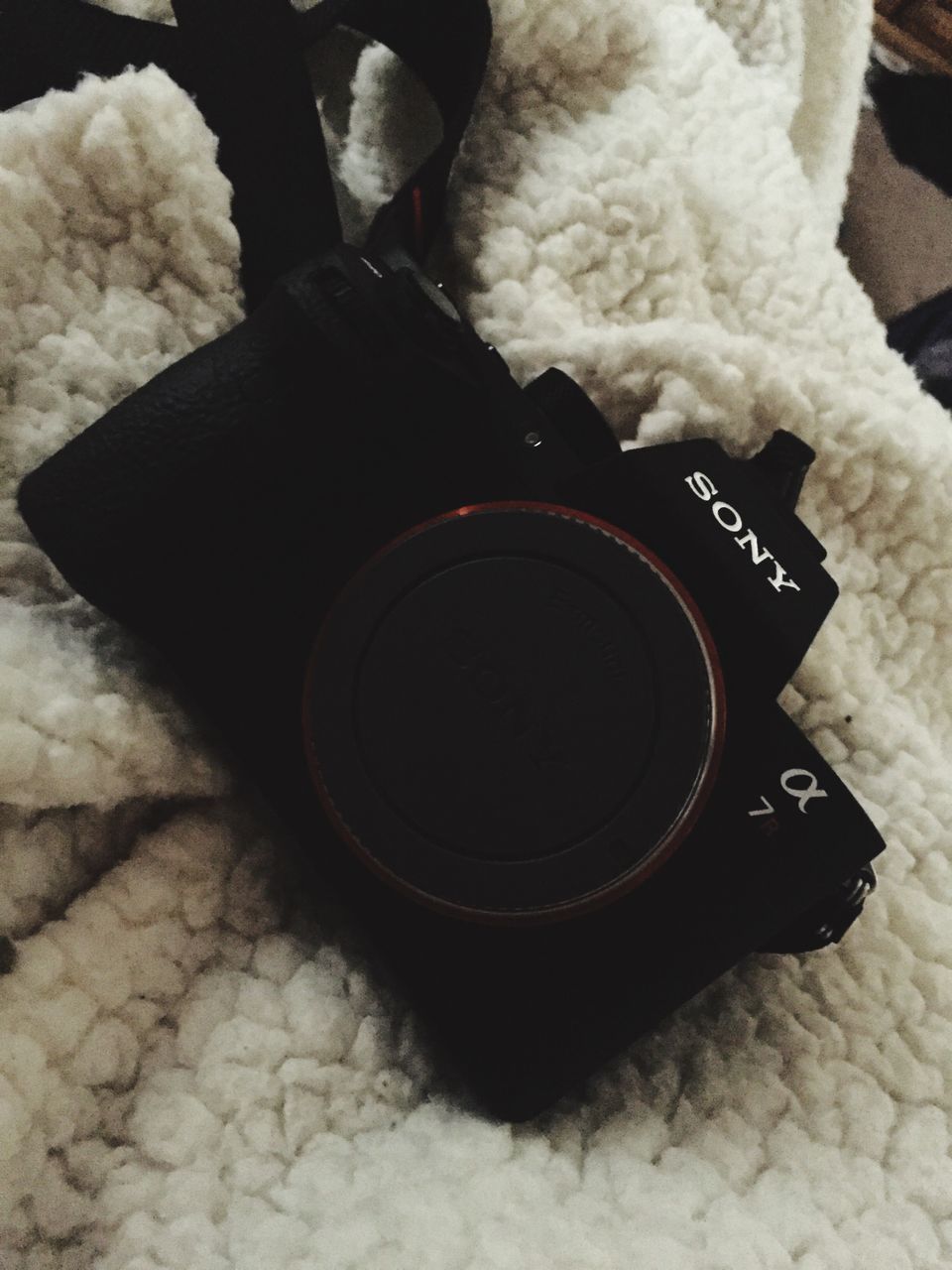 indoors, high angle view, still life, close-up, technology, communication, table, single object, no people, text, photography themes, camera - photographic equipment, old-fashioned, black color, white color, wireless technology, retro styled, equipment, elevated view, number