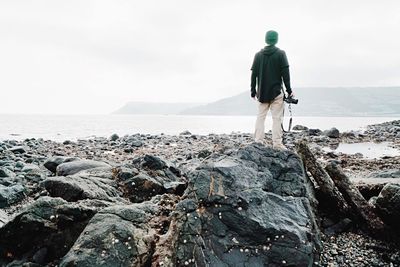 Rear view of man on beach