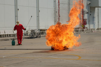 People standing by fire hydrant