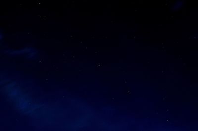 Low angle view of stars in sky at night