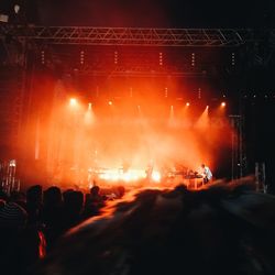 Crowds enjoying music concert at night