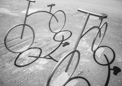 High angle view of bicycle on footpath