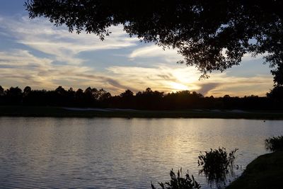 Scenic view of lake during sunset