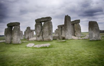 Ruins of historical building against cloudy sky