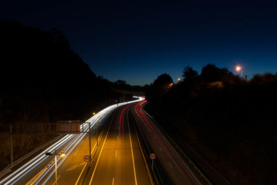 Road with traffic trails at night