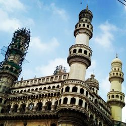 Low angle view of historical building against sky in city