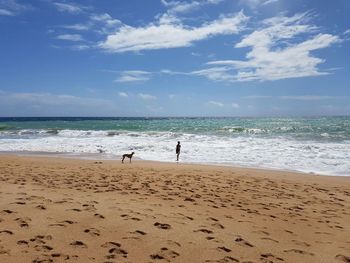 Scenic view of beach against sky