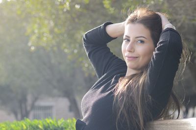 Portrait of smiling young woman outdoors