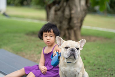 Portrait of girl with dog