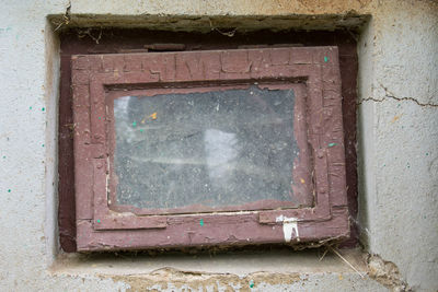 Close-up of window on wall of building