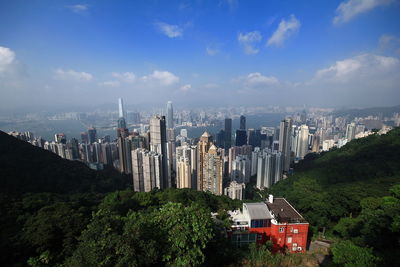 High angle view of buildings in city against sky