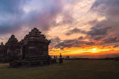 View of dramatic sky over landscape during sunset