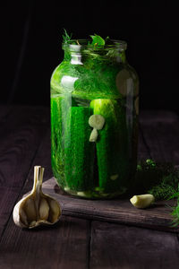 Close-up of fruits in jar on table