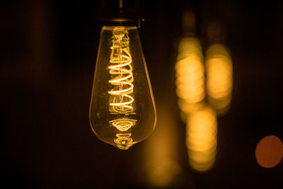 Close-up of illuminated light bulb