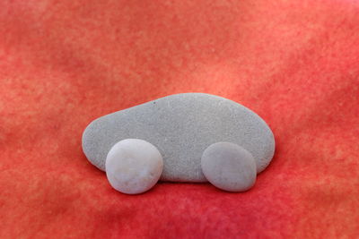 Close-up of heart shape on red surface