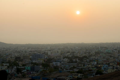 High angle view of townscape against sky during sunset