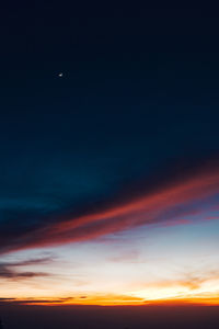 Low angle view of dramatic sky at sunset