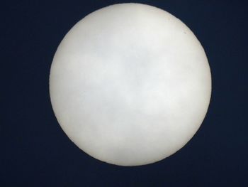 Close-up of moon over black background