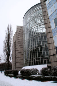 Low angle view of modern building against clear sky