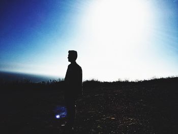 Silhouette of man against sky