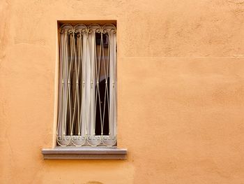 Close-up of window on building wall