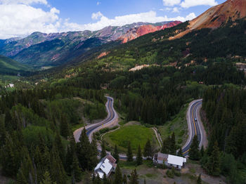 High angle view of trees and mountains against sky