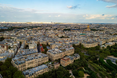 Aerial city landscape of paris, lots of roofs characteristic roofs and chimney