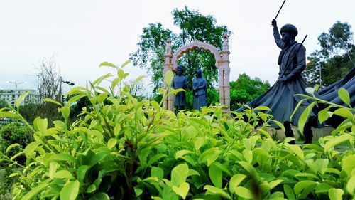 Low angle view of statue against sky