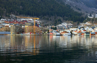 Buildings by lake