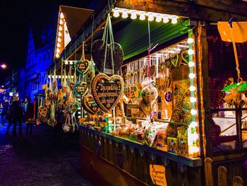 Close-up of souvenir shop at night